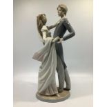 A large Lladro porcelain figure 'I Love You Truly', number '1528', in original box with packaging,