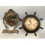 A German Schatz Royal Mariner 8-day ship's brass bulkhead clock, in ship's wheel surround, overall