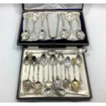 A cased set of six Queens pattern silver teaspoons and sugar tongs, Sheffield, 1894, maker's mark of