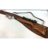 An Anschutz model 335 .22 calibre air rifle, serial number 032089, fitted with 3-9X40E scope, with
