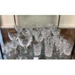 A small collection of assorted glassware comprising stemmed wine and sherry glasses etc. some Webb