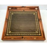 A large walnut marquetry inlaid writing slope opening to reveal a gilt tooled green leather