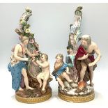 A pair of 19th Century Meissen figural candlesticks, both with figures beneath a scrolled tree