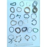 A selection of costume jewellery consisting of 26 x bangles, bracelets and chains, including a Liz
