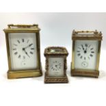 Three assorted brass cased carriage clocks comprising a miniature example by J. W. Benson, London,