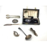 A silver novelty shoe pincushion (lacking pad), Birmingham, maker's makers CS*FS, together with a