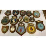 Approximately 70 various painted plaster ships crests including Cardiff, Tartar, Oakleaf, Mohawk,