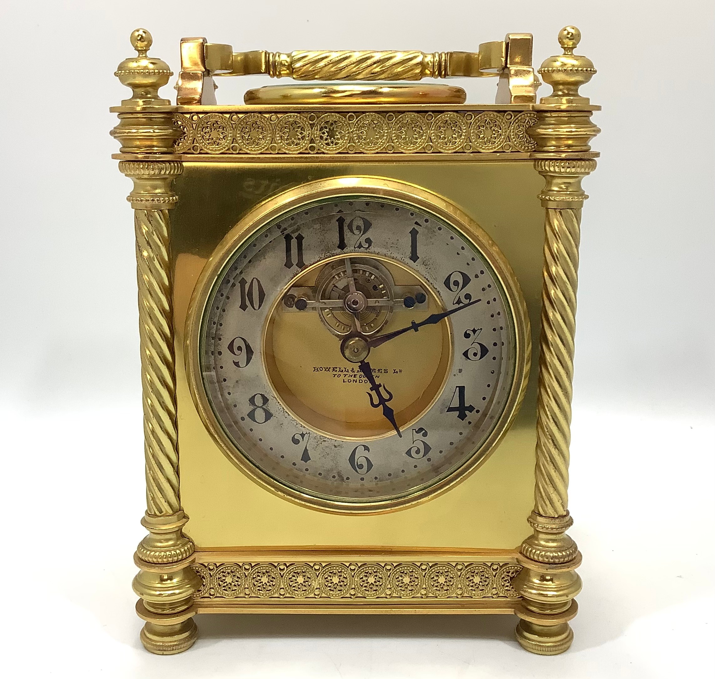 A brass carriage clock by Howell & James Ltd, the dial with exposed escapement and silvered - Image 2 of 8