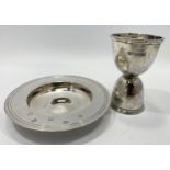 A reversible silver egg cup London, 1903, maker's mark of Goldsmiths & Silversmiths, together with a