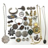 A small quantity of costume jewellery and silver jewellery including necklaces, bangles and brooches