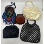 A ladies hand-made beadwork evening purse, together with three vintage purses and a compact