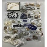 A large collection of 87 x various items of costume jewellery, including bracelets, chains,