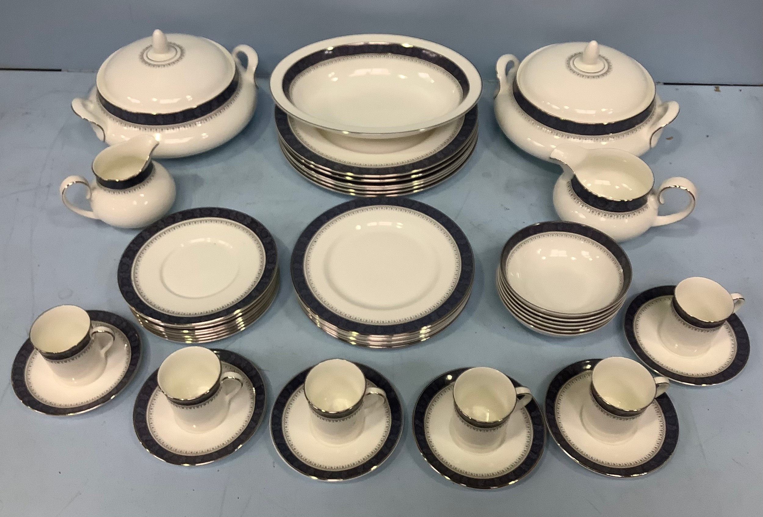 A Royal Doulton 'Sherbrooke' pattern six place dinner service, including 2 Tureens, 1 oval dish,