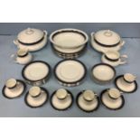 A Royal Doulton 'Sherbrooke' pattern six place dinner service, including 2 Tureens, 1 oval dish,