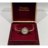 A ladies 9ct gold-cased cocktail watch, by Everite, with white enamel dial, subsidiary seconds dial,