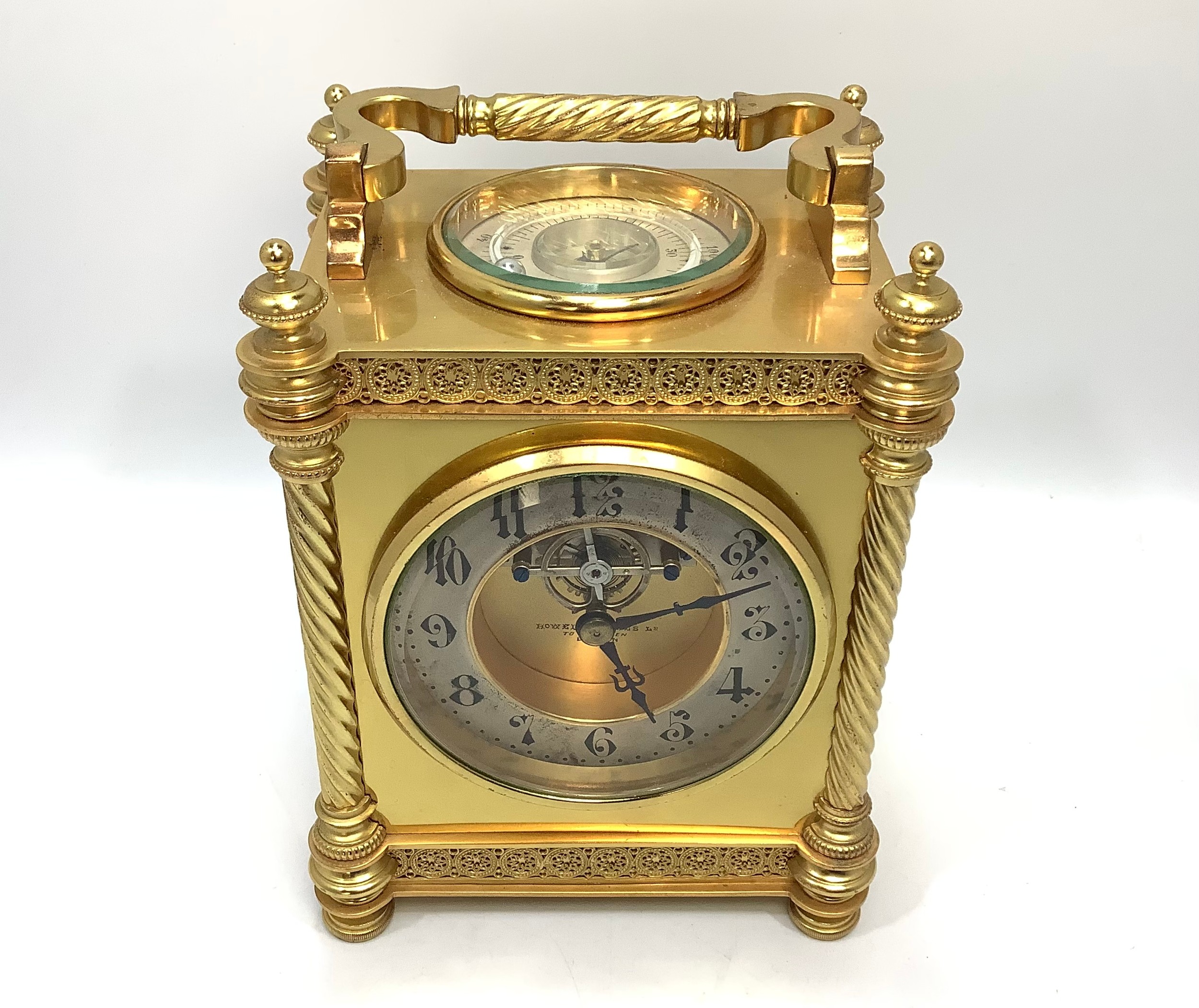 A brass carriage clock by Howell & James Ltd, the dial with exposed escapement and silvered - Image 3 of 8