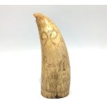 A 19th century Scrimshaw sperm whale's tooth engraved with a sailor and a lady with ship in the