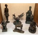 A collection of six assorted bronze and spelter figures comprising a seated huntsman with dog, a
