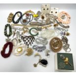 A collection of 65 x various items of costume jewellery including brooches, chains, necklaces and