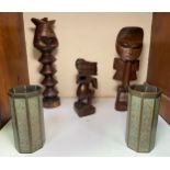 Three various ethnic carved wooden figures, possibly fertility, together with a pair of Kinco