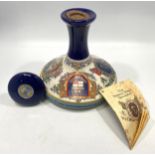 A British Navy Pusser's Rum 1.0 litre 95.5% in Wade ceramic decanter, with contents, sealed and with