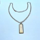 A 9ct gold large hallmark ingot pendant, with a 9ct gold belcher chain, measuring 20 inches in