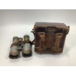 A pair of German Imperial army Fernglas 08 aluminium and brass binoculars in leather carry case