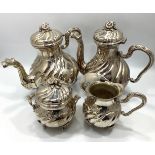 A four piece silver-plated tea and coffee set comprising teapot and coffee pot with stylised