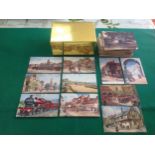 A box containing around 130 oilette old postcards published by Raphael Tuck from various series. A