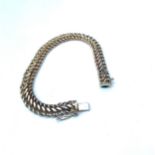 A 9ct gold double link bracelet, weighing 9.0 grams.