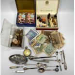 An assortment of various collectables including a small quantity of silver button hooks, fruit