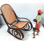 A bentwood bergere Thonet style rocking chair, together with a blackamoor dumb waiter and two