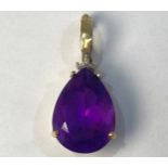 A 9ct gold pendant, set with an amethyst, weighing 5.0 grams.