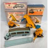 Four various Dinky models including Pullmore Car Transporter no. 582, Supertoys Coles Mobile Crane