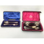 A pair of Edwardian silver twin-handled table salts, London, 1907,in fitted retail box, and a