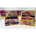 A Dinky Toys Thunderbirds model of Lady Penelope's Fab1 100 in matt pink, with Lady Penelope and