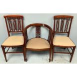 An Edwardian inlaid tub chair together with a pair of Edwardian inlaid dining chairs, all with beige