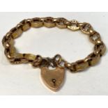 A 15ct gold bracelet with heart-shaped clasp, weighing 17.6 grams. Bracelet not marked but tests