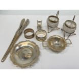 A small collection of assorted silver items comprising a glove stretcher by Mappin Brothers, a