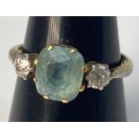 A 9ct gold ring, set with a cushion cut aquamarine in a claw setting, ring weighs 2.7 grams,