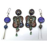 A large pair of Chinese earrings with circular cloisonné enamel flaming pearl tops suspending panels