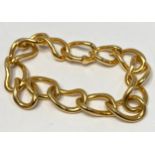 An 18ct gold bracelet of interlocked curved links, with hidden clasp fastening, weighing 38.4 grams.