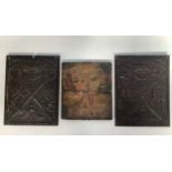 A pair of 18th century ecclesiastical carved wooden panels, one carved with crossed swords, keys,