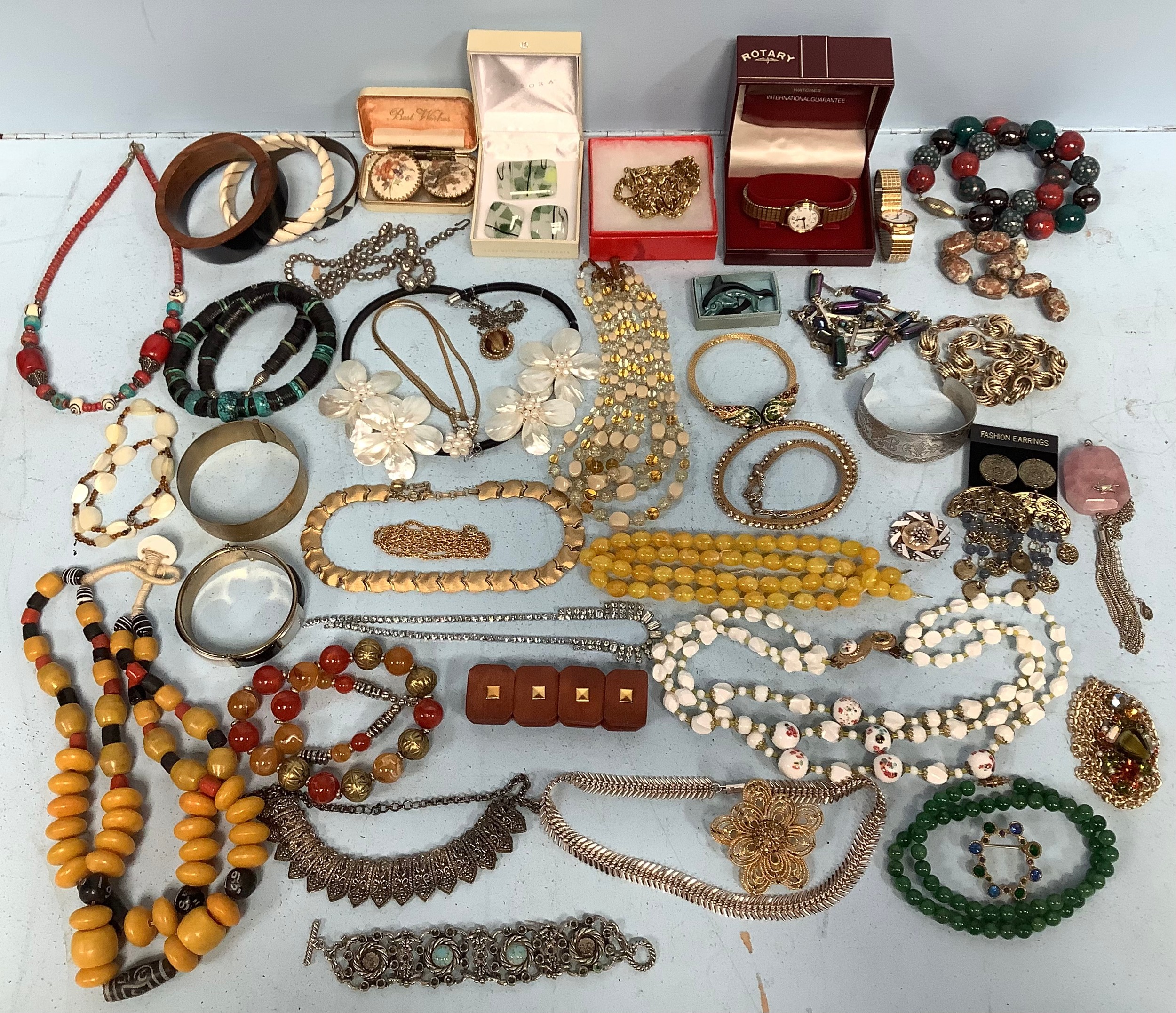 A large quantity of costume jewellery including a Ciro necklace, 18ct gold plated bangle, watches,