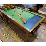 A coin operated 20th Century mahogany-framed slate bed bar billiards table by Riley. (as found)