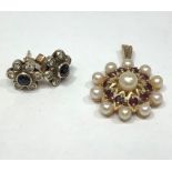 A pair of gold, diamond and sapphire stud earrings in a flowerhead design, 3g, together with a 9ct