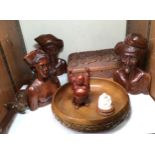 An Indian table-top carving set together with three various Oriental carved busts, wooden bowl,