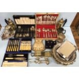 A collection of assorted silver-plated wares comprising a canteen of cutlery and various cased