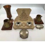 A small collection of assorted trench art items including a pair of ashtrays with relief moulded