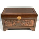 An oriental stained and carved blanket box with camphor wood lining, 102cm wide